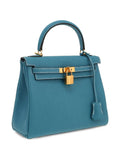Hermès Pre-Owned 2023 Kelly 25 two-way handbag in blue leather with padlock, stylish and trendy for men and women's fashion.