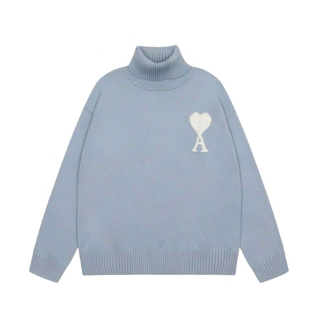 Light blue Ami de Coeur funnel neck sweater featuring a heart monogram, perfect for trendy casual outfits in 2025.
